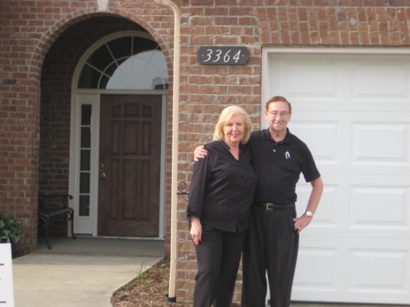 New homeowners at their front door